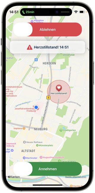 Smartphone mit Alarm der App Region der Lebensretter: Herzstillstand, Karte, Knöpfe Annehmen und Ablehnen